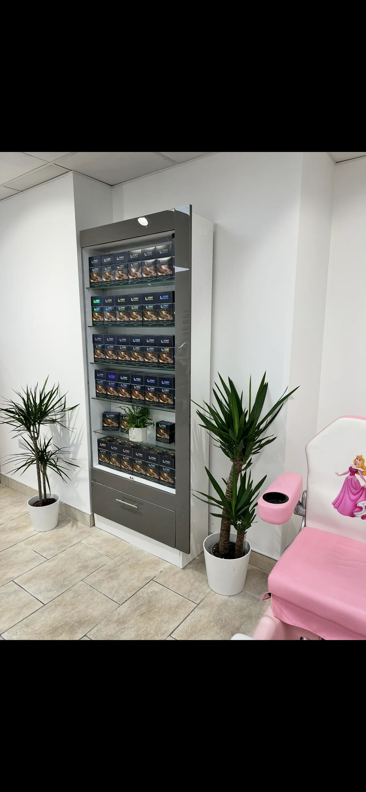 Product display and plants inside Foxy Nails and Spa Athlone